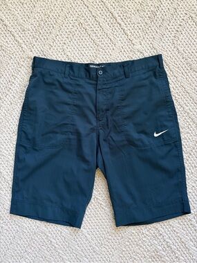 Nike Golf Sport Dri-Fit Navy Shorts with White Logo Flat Front Mens 36 EUC